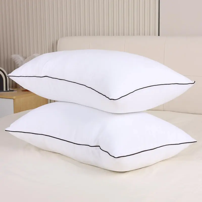 Ufist standard-sized hotel-style sleeping pillows;  lightweight, soft, and quick to rebound.  pillows provide support for the...