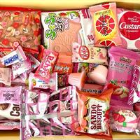 Pink Asian Snack Box with Ramen Drinks Includes Various Candy and Snacks Featuring Strawberry Flavors Sweet