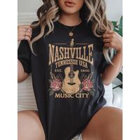 Nashville Tennessee Music City Graphic T-Shirt - Women's Black Washed Tee with Guitar & Floral Print, Round Neck Short Sleeve...