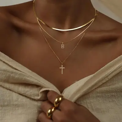 TASISO Layered Gold Necklaces for Women Tiny Initial Necklaces 14K Gold Plated Stackable Necklaces with CZ Cross Design Safe...