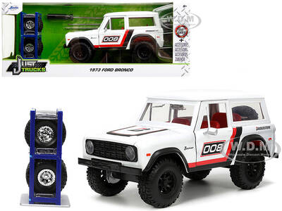 1973 Ford Bronco 008 White with Red and Black Stripes and Red Interior with Extra Wheels \