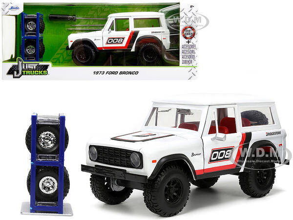 1973 Ford Bronco 008 White with Red and Black Stripes and Red Interior with Extra Wheels \