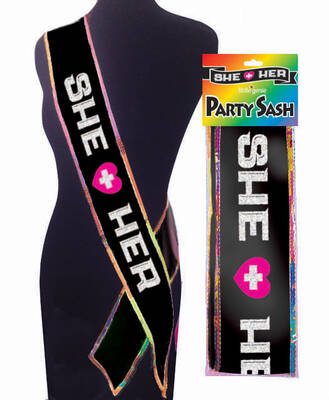 She Plus Her Sash
