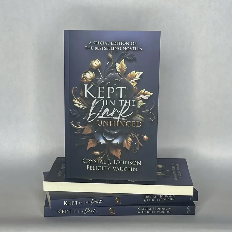 Kept in the Dark - Unhinged, a special edition novella by Crystal J. Johnson and Felicity Vaughn - paperback dark romance boo...