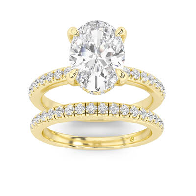 Aurelia Lab Grown Oval Shaped Diamond Engagement Ring with the BonBon Half Coverage Wedding Band | 18K Yellow Gold 2 1/6 ct. ...