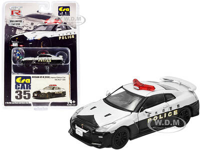 Nissan GT-R (R35) RHD (Right Hand Drive) Japan Police Car with Figurine Limited Edition to 1200 pieces 1/64 Diecast Model Car...