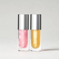 Skinn Cosmetics: Divine Elixir Lip Oil Duo Shade- Golden + Blush Makeup Smooth
