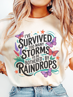 I've Survived Too Many Storms to Be Bothered by Raindrops ~ Unisex Apparel Printed In The USA!