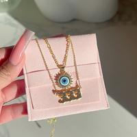 Angel number and evil eye necklace set