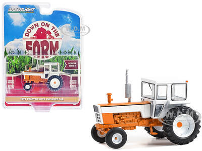 1973 Tractor with Enclosed Cab Orange and White \