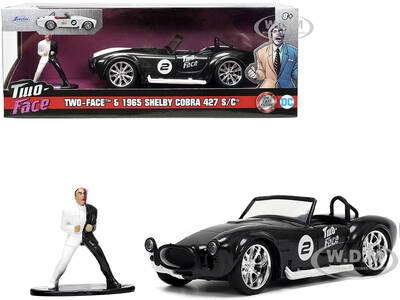 1965 Shelby Cobra 427 S/C 2 Black Metallic and White and Harvey Two-Face Diecast Figure \