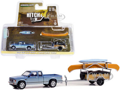 1988 GMC S-15 Sierra Pickup Truck Blue Metallic and White with Stripes and Canoe Trailer and Canoe Rack with Canoe and Kayak ...