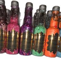 GiGi's Glitter Gala 2oz - Colorful Glitter in Bottles with Various Shades Displayed