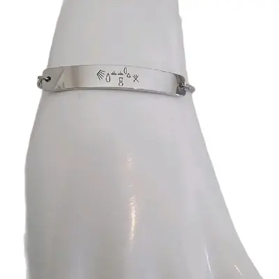 Stainless steel brazalete with engraved symbols Auspicious