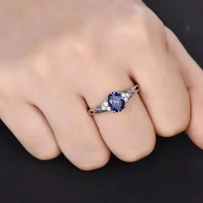 Cluster Blue Oval Cut Sapphire And Diamond Engagement Ring