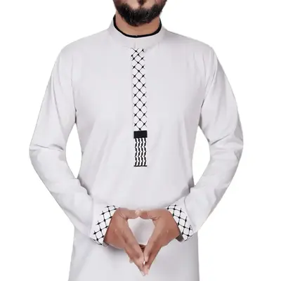 Embroidered Freedom Thobe. Premium, breathable fabric  Tailored yet relaxed fit  Minimalist design for versatile wear