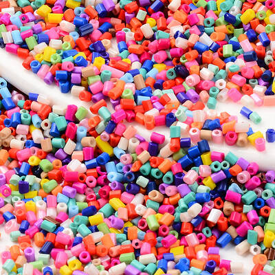 Two Cut Glass Seed Beads