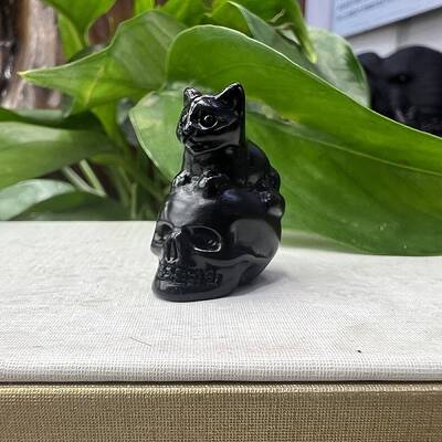Natural Obsidian Carved Skull with Cat Figurines