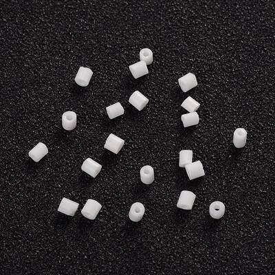 Two Cut Glass Seed Beads
