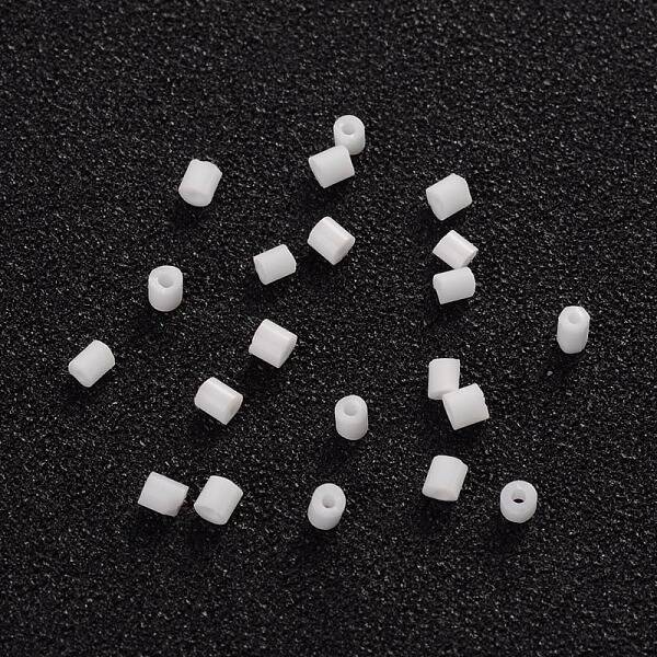 Two Cut Glass Seed Beads