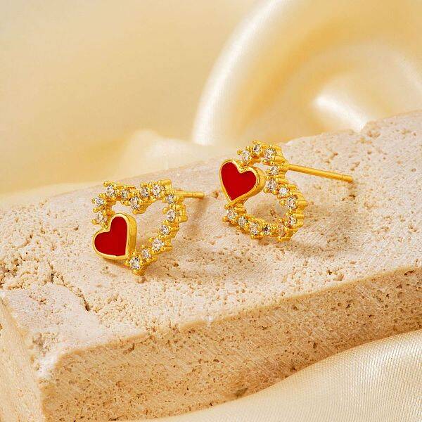 Exquisite Hollow Heart Brass Stud Earrings