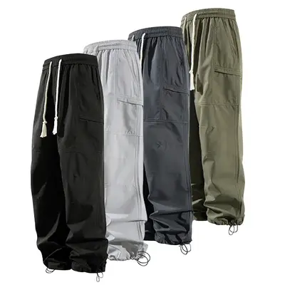 Men's Loose Solid Pocket Drawstring Waist Cargo Pants, Casual Comfy Zipper Cargo Pants for Daily Outdoor Wear, Baggy Trousers...