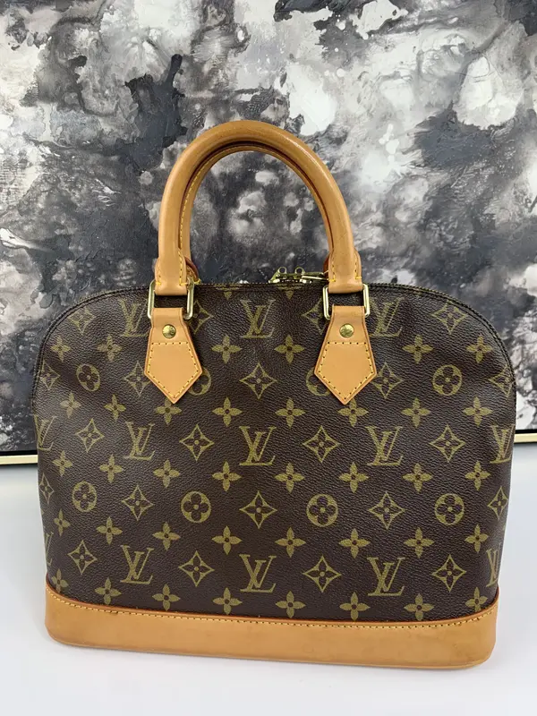 Pre-owned Louis Vuitton coated canvas and vachetta leather Tote Bags Alma PM