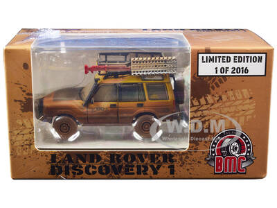 Land Rover Discovery 1 RHD (Right Hand Drive) Camel Trophy Yellow (Dirty Mud Version) with Roof Rack Extra Wheels and Accesso...