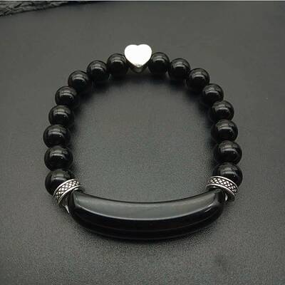 Fashionable crystal tiger eye hand bracelet with red agate heart pendant.