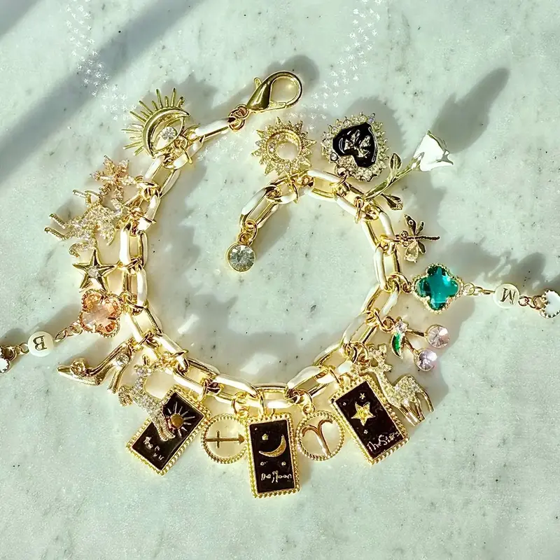 Custom charm bracelet 14k -18k Gold Plated,Silver plated or stainless steel adjustable chain options. Featuring gold plated c...