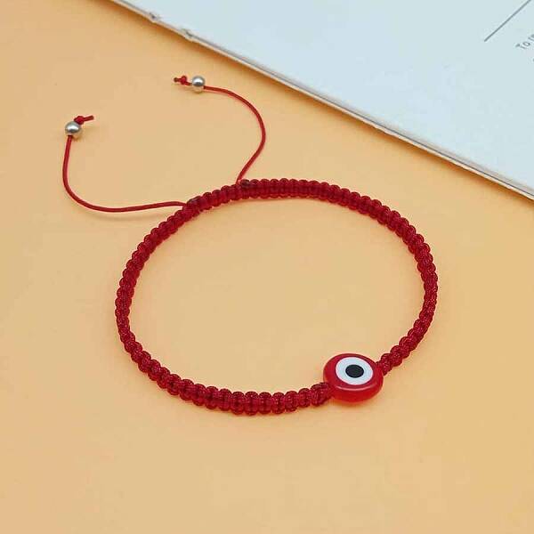 Woven bracelet with blue eyes