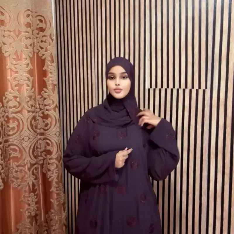 This is Close Abaya with hijab and Double Chiffon - Woven Polyester 100% with Unique Pleats & Contrast Binding for Premium Du...